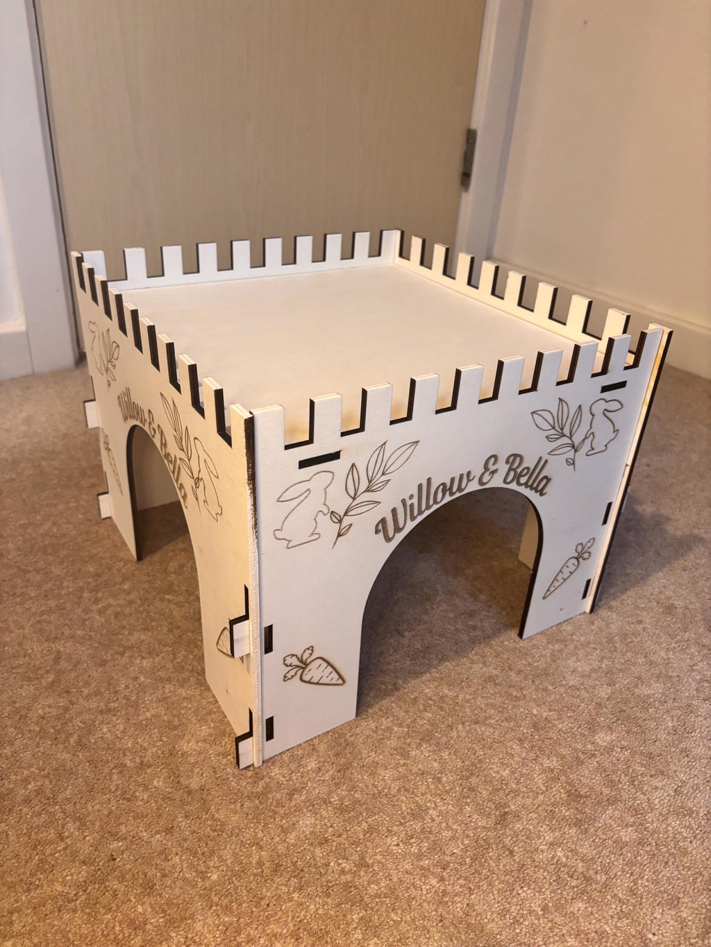Animal Castle is suitable for Rabbits,  This Castle is personalised with your Animal's name on the Front and side.
