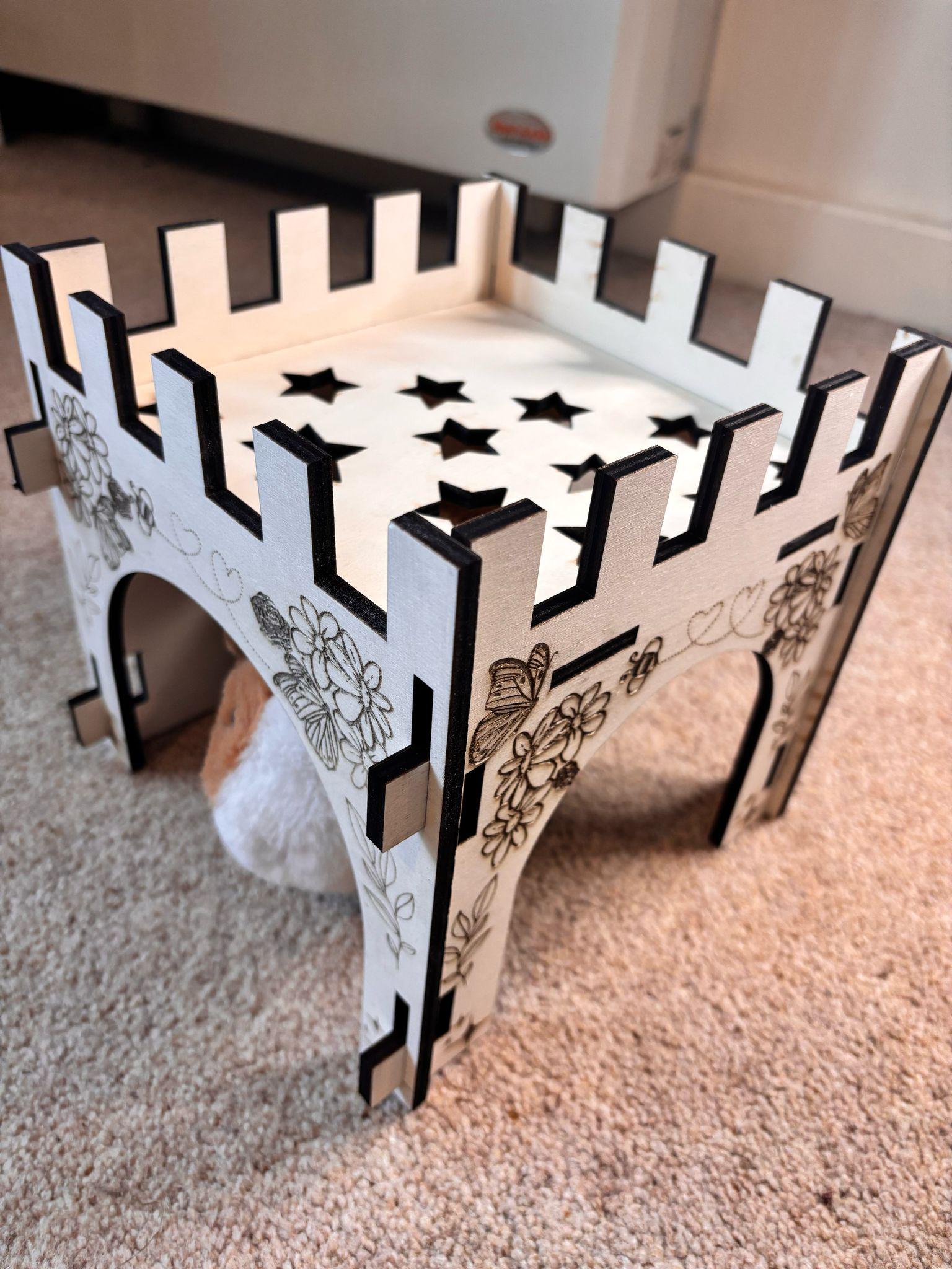 Small Animal Castle suitable for Guinea Pigs and Hamsters,  This Castle is personalised flowers on three sides of the turret