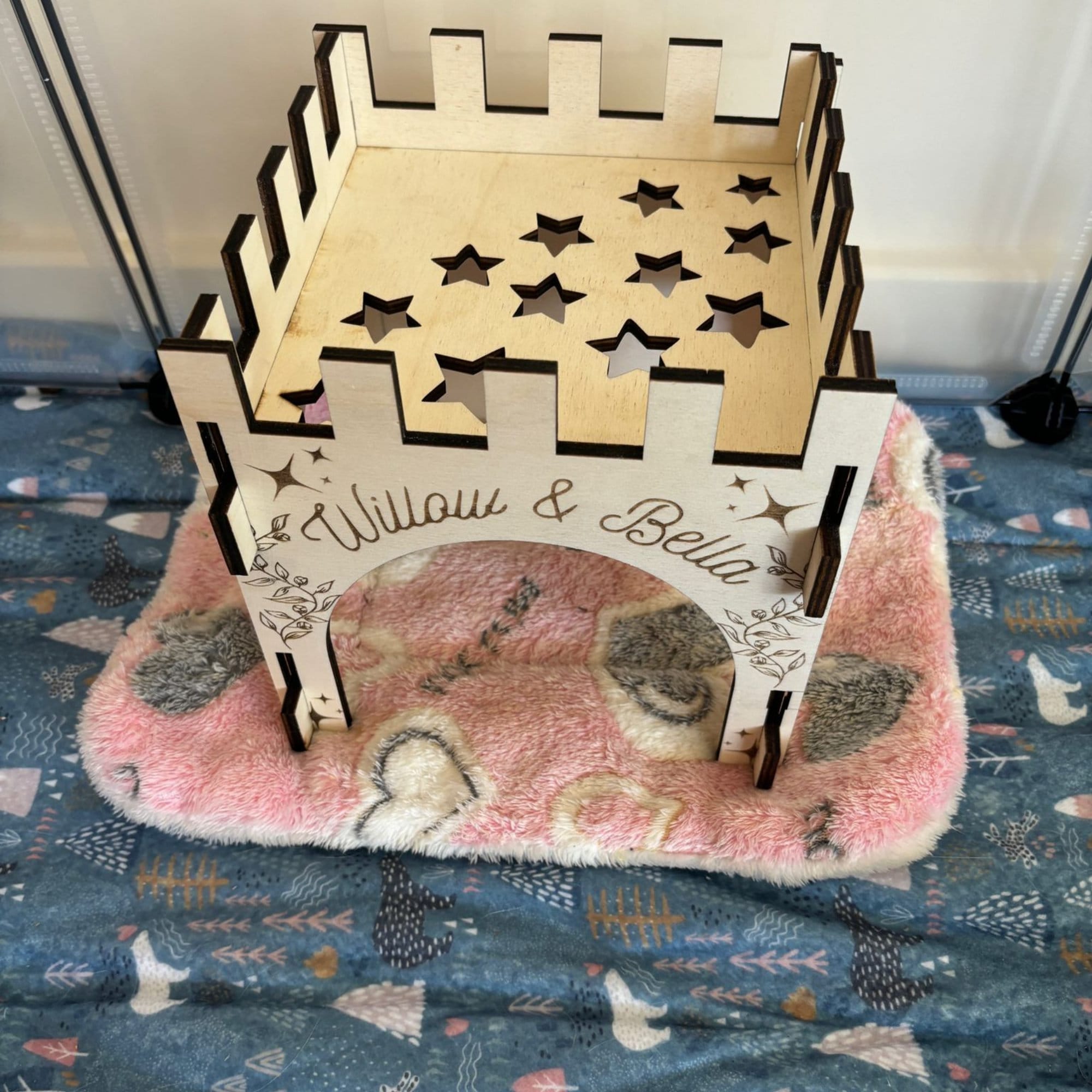 Small Animal Castle suitable for Guinea Pigs and Hamsters,  This Castle is personalised with your Animals name on the Front and side.