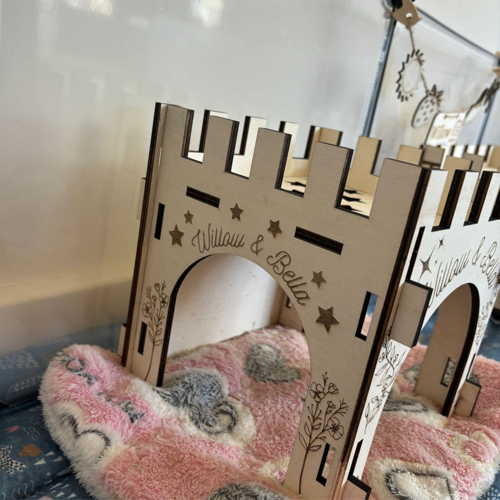 Small Animal Castle suitable for Guinea Pigs and Hamsters,  This Castle is personalised with your Animals name on the Front and side.